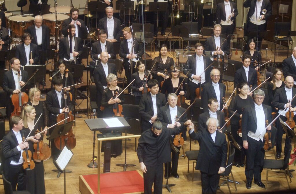 Samy Moussa and Manfred Honeck with the Pittsburgh Symphony onstage at Heinz Hall