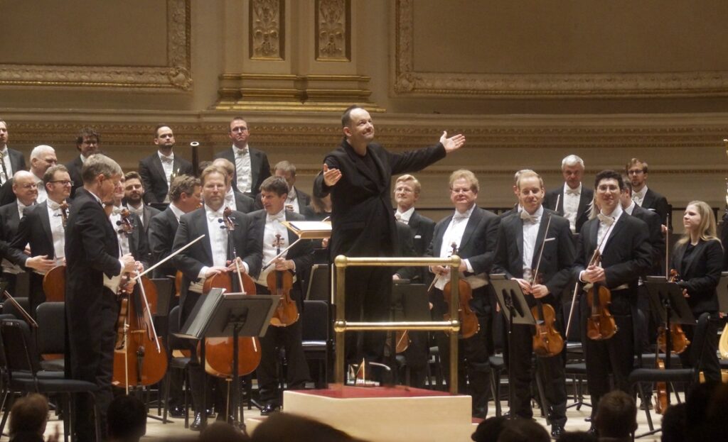 Andris Nelsons and the Vienna Philharmonic onstage at Carnegie Hall