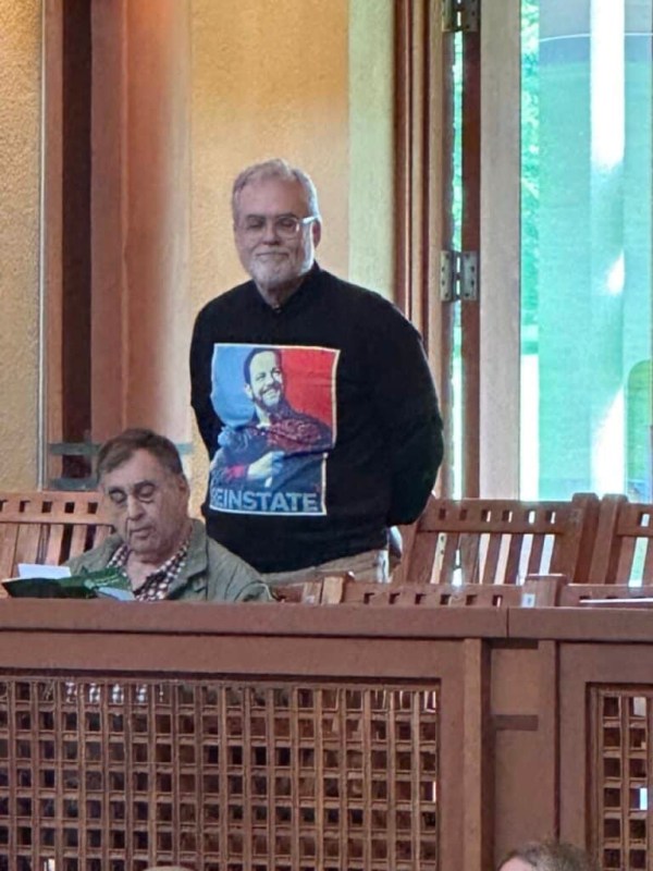 BSO Patron protesting with an Andris Nelsons "Reinstate" t-shirt